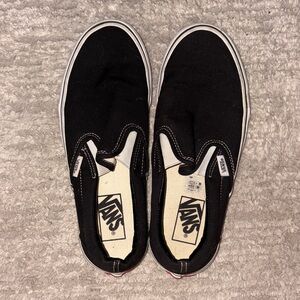 Vans Black Canvas Slip-Ons
